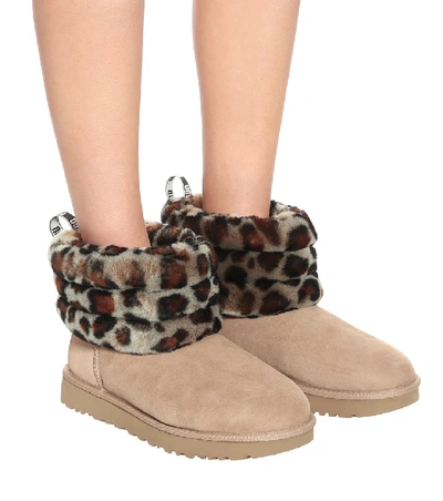 Shop Ugg Fluff Mini Suede Ankle Boots In Beige