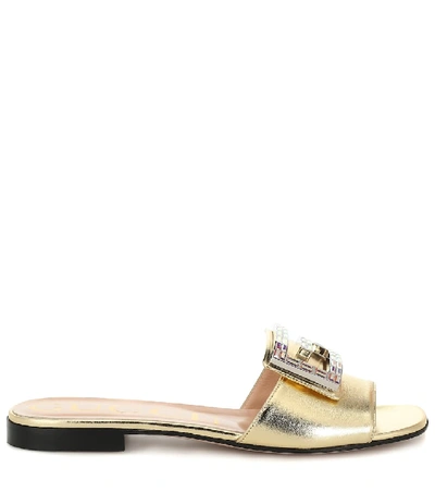 Shop Gucci Metallic Leather Slides In Gold