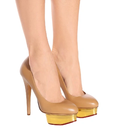 Shop Charlotte Olympia Dolly Plateau Pumps In Beige