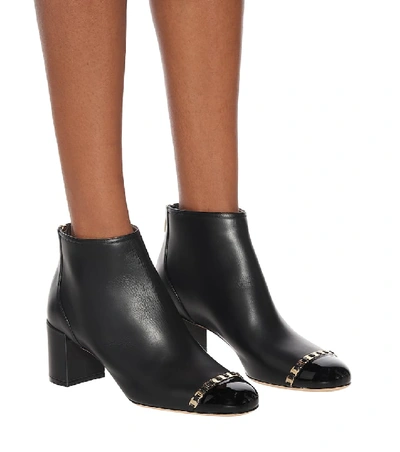 Shop Ferragamo Vara Chain Leather Ankle Boots In Black