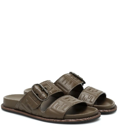 Shop Fendi Ff Embossed Leather Sandals In Brown