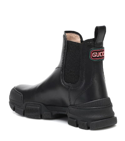 Shop Gucci Leather Ankle Boots In Black