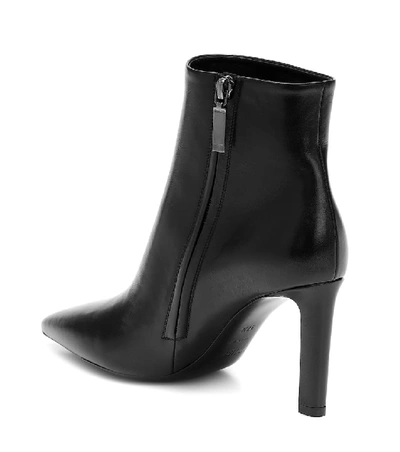 Shop Saint Laurent Kate 85 Leather Ankle Boots In Black
