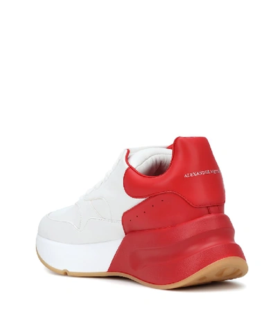 Shop Alexander Mcqueen Oversized Runner Leather Sneakers In White