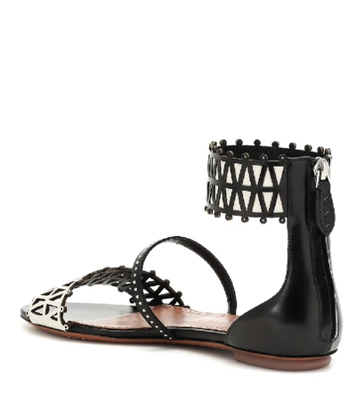 Shop Alaïa Studded Leather Sandals In Black