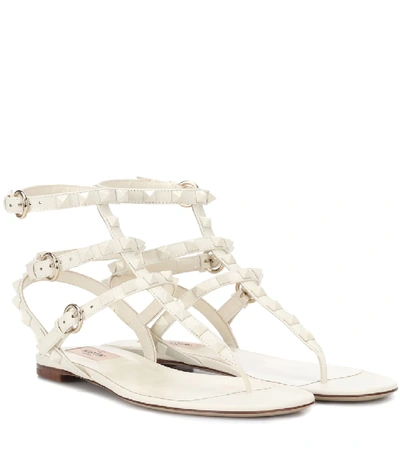 Shop Valentino Rockstud Leather Sandals In White