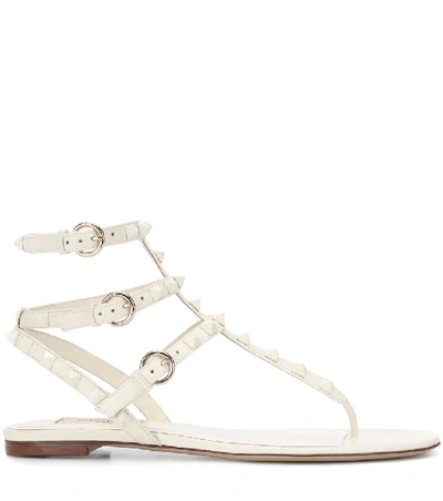 Shop Valentino Rockstud Leather Sandals In White