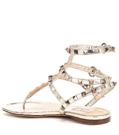 Valentino Rockstud Flat Leather Sandals In Metallic