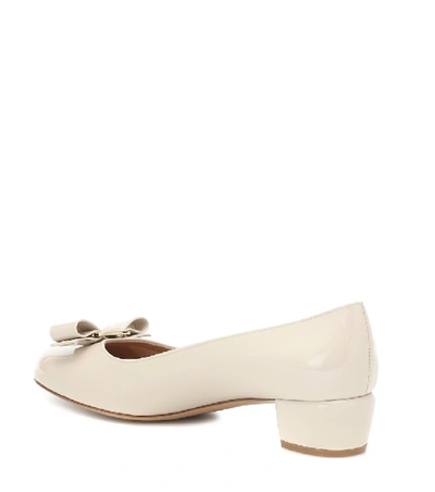 Ferragamo Vara Patent Leather Pumps In White