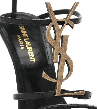 Shop Saint Laurent Cassandra 110 Leather Sandals In Black