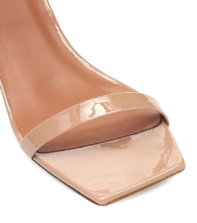 Shop By Far Tanya Patent Leather Sandals In Beige