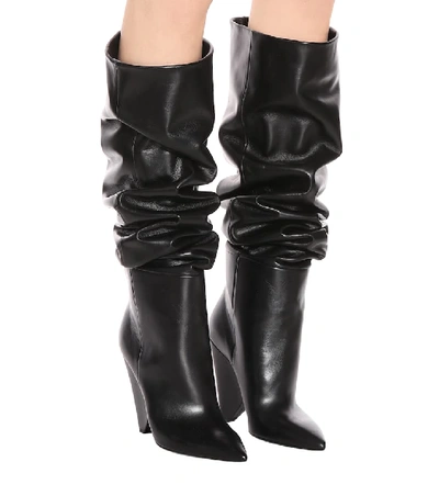 Shop Saint Laurent Niki 105 Leather Boots In Black