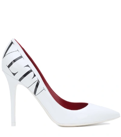 Shop Valentino Vltn Leather Pumps In White