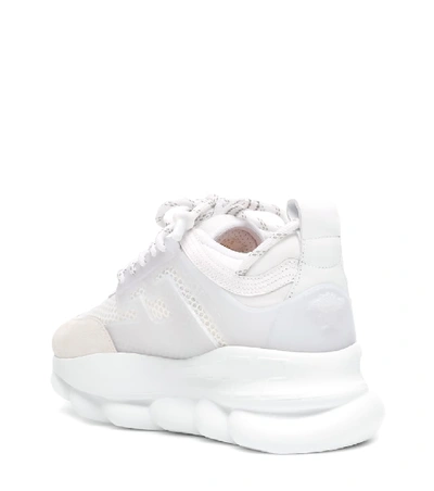 Shop Versace Chain Reaction Sneakers In White