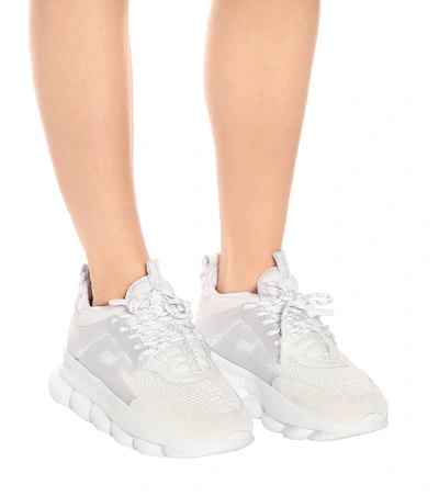 Shop Versace Chain Reaction Sneakers In White