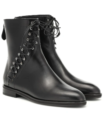 Shop Alaïa Leather Ankle Boots In Black