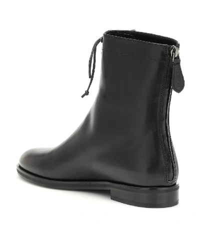 Shop Alaïa Leather Ankle Boots In Black