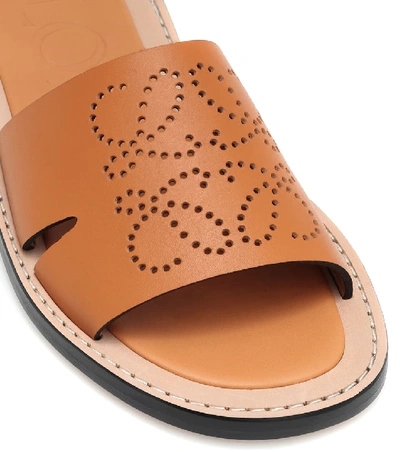 Shop Loewe Anagram Leather Slides In Brown