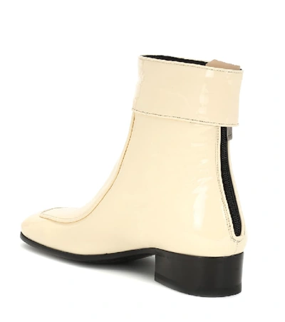 Shop Saint Laurent Miles Leather Ankle Boots In White