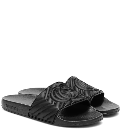 Shop Gucci Embossed Slides In Black