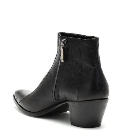 Shop Saint Laurent Finn Leather Ankle Boots In Black