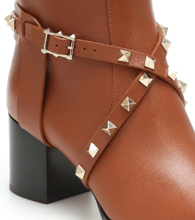 Shop Valentino Rockstud Riding Leather Knee High Boots In Brown