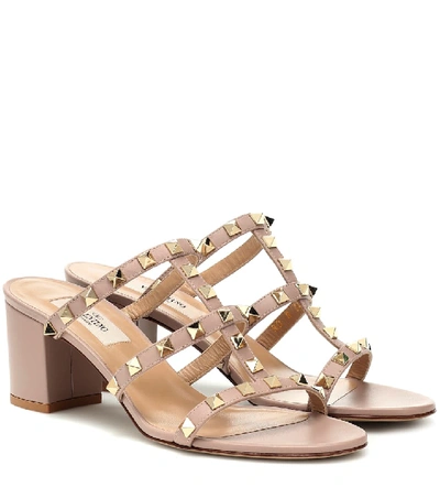 Shop Valentino Rockstud Leather Sandals In Pink