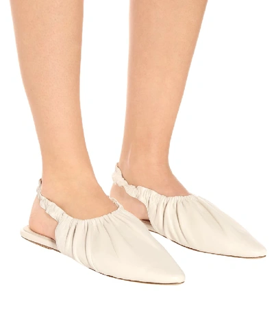 Shop Nanushka Zuo Slingback Leather Ballet Flats In White