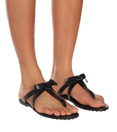 Shop Tod's Leather Thong Sandals In Black