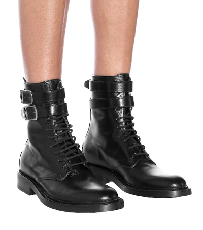 Shop Saint Laurent Army Leather Ankle Boots In Black