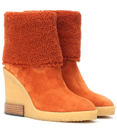 Shop Tod's Suede Wedge Ankle Boots In Orange