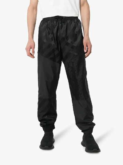 Shop Fendi Monogram Logo Track Pants In Black