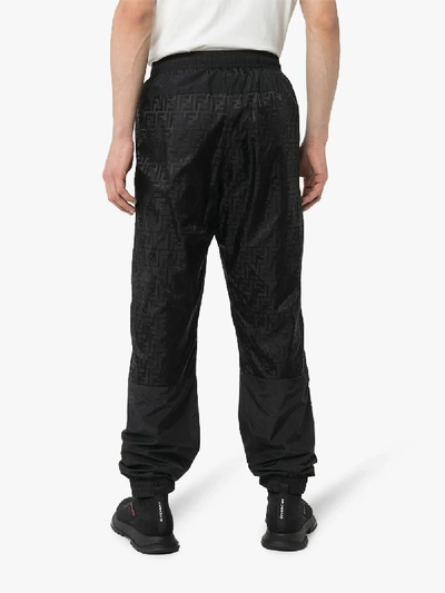 Shop Fendi Monogram Logo Track Pants In Black