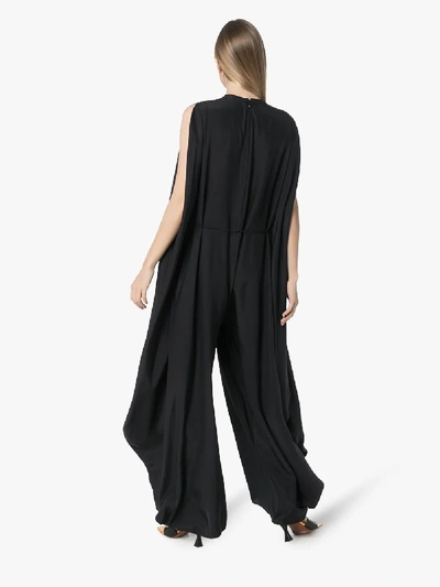 Shop Stella Mccartney Flared Silk Jumpsuit In Black