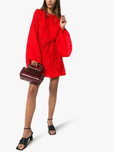 Shop Stella Mccartney Belted Long Sleeve Silk Dress In Red