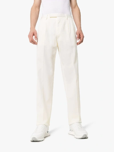 Shop Ermenegildo Zegna Double Pleated Tapered Trousers In White