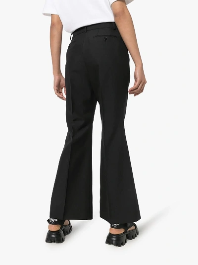 Shop Gucci Red Label Flared Wool Trousers In Black