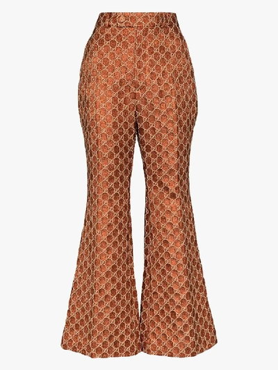 Shop Gucci Gg Jacquard Flared Trousers In Orange