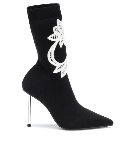 Shop Alexander Mcqueen Lace-trimmed Knitted Ankle Boots In Black