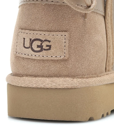 Shop Ugg Classic Bow Shearling Suede Boots In Beige