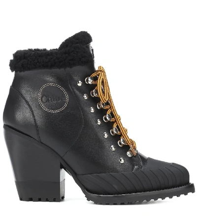 Shop Chloé Rylee Leather And Shearling Boots In Black