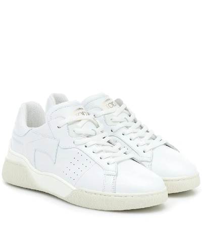 Shop Tod's Leather Sneakers In White