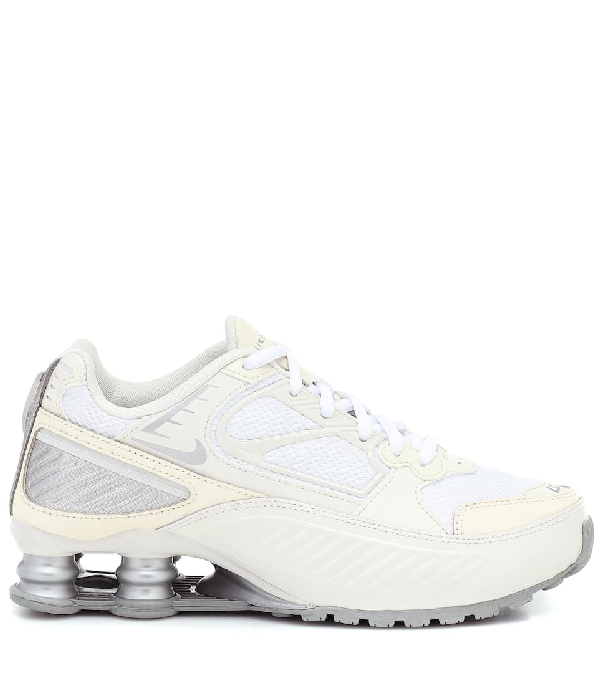 nike cream and silver shox enigma 9000 sneakers
