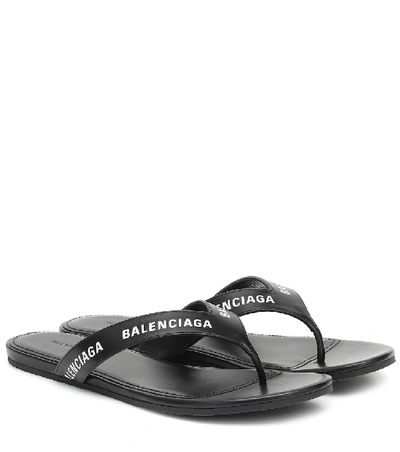 Shop Balenciaga Logo Leather Thong Sandals In Black