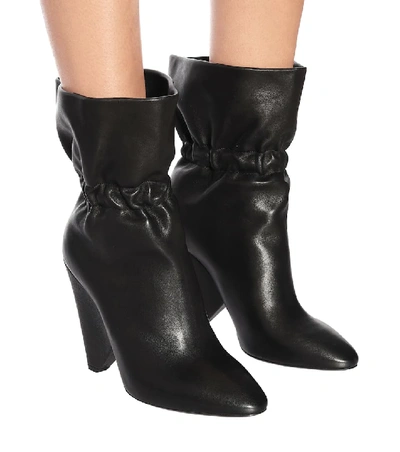 Shop Saint Laurent Niki 105 Leather Ankle Boots In Black