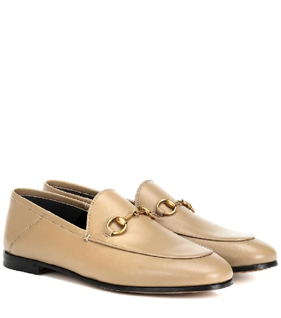 Shop Gucci Horsebit Leather Loafers In Beige