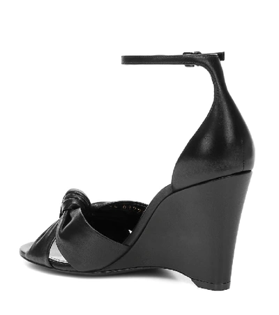 Shop Saint Laurent Lila 85 Leather Wedge Sandals In Black