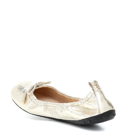 Shop Tod's Metallic Leather Ballet Flats In Gold