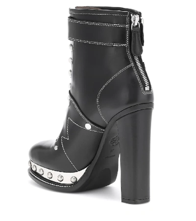 Shop Alexander Mcqueen Leather Ankle Boots In Black