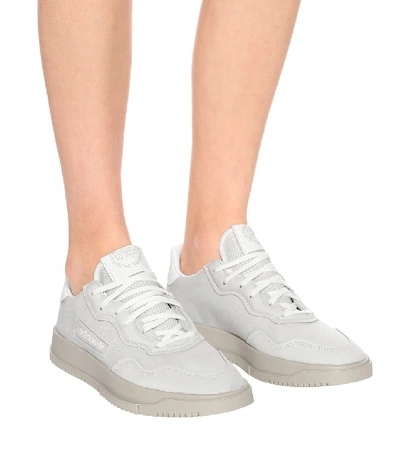Shop Adidas Originals Sc Premiere Suede Sneakers In White